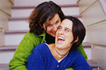 Image of female couple on stairs.